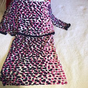 Colorful patterned. Shows as a two piece dress. One small stain as shown in pic.